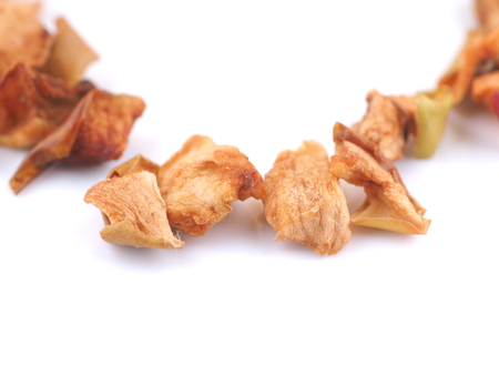 slices of dry apples on a white backgroundの写真素材