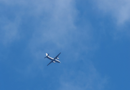airplane in the cloudsの写真素材