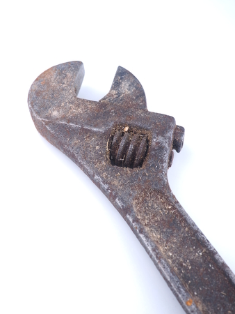 old adjustable wrench on white backgroundの写真素材
