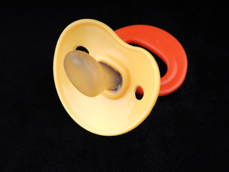 soother on a black background