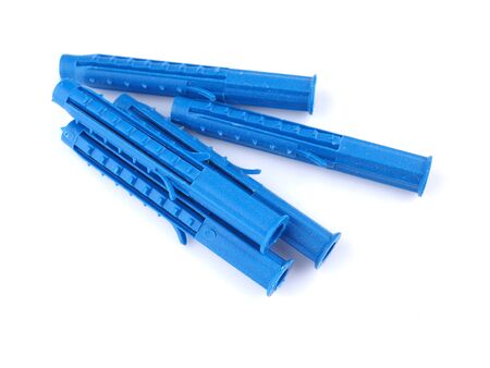 blue dowels on a white backgroundの写真素材