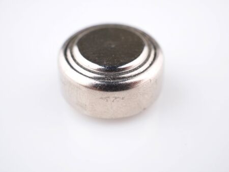 round battery on a gray background