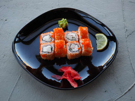 Japanese kitchen. Sushi and rolls on gray concrete backgroundの写真素材