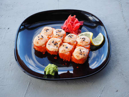 Japanese kitchen. Sushi and rolls on gray concrete backgroundの写真素材