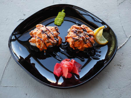Japanese kitchen. Sushi and rolls on gray concrete backgroundの写真素材