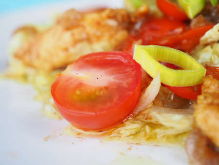 Chicken salad on blue wooden backgroundの写真素材