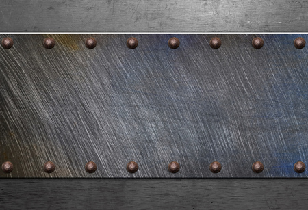 Riveted metal plateの写真素材