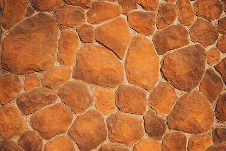 a wall of red, not even stone, pear-shaped.の写真素材