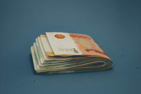 hick stack of cash money. The concept of rich, wealth, profits, business and finance. Five...