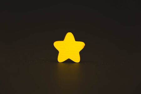 yellow stars on black background.の写真素材