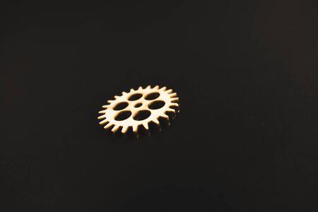 mechanisms of wood on a black background. gearの写真素材