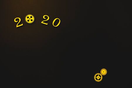 2020 year arrangements on a black background. industry concept.