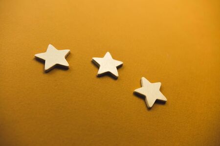 white stars on an orange background.の写真素材