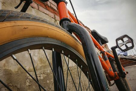 Detail of vintage Bicycle wheel with worn out tireの写真素材