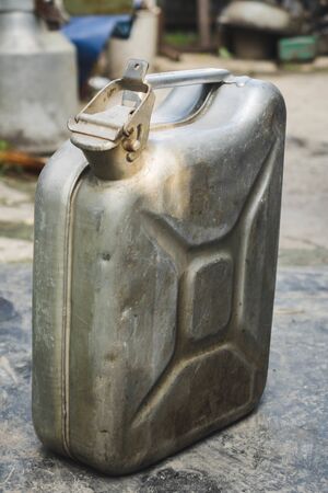 Old metal jerrycan or gasoline canister fuel can.の写真素材
