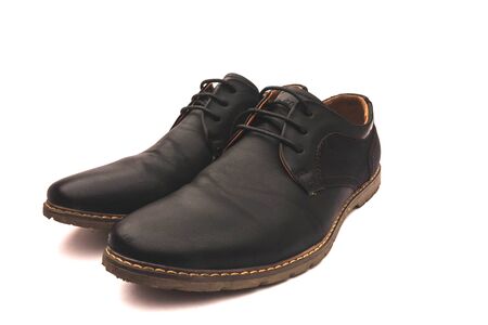 Male leather shoes, side view, isolated on white background.の写真素材