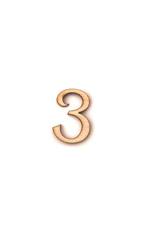 wooden figure three isolated on white backgroundの写真素材