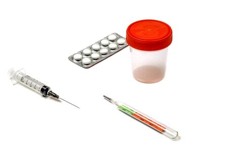 pills, syringe, thermometer and medical items on white backgroundの写真素材
