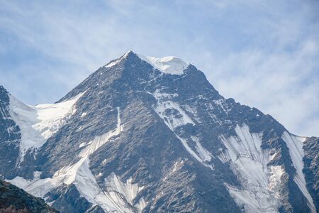 high mountain of the Caucasus half in snow.の写真素材