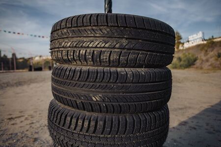 car rubber tires lying on top of each otherの写真素材