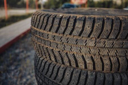 car rubber tires lying on top of each otherの写真素材