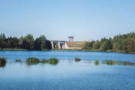 a small water dam near the lakeの写真素材