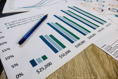 financial and business color charts and graphs on the table.の写真素材