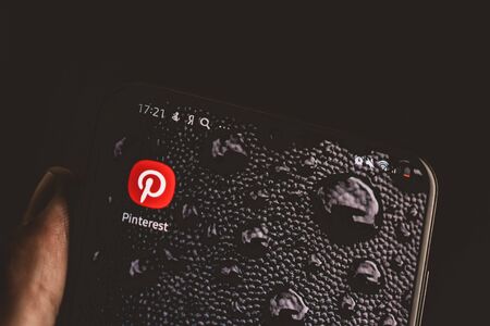 Saint Petersburg, Russia, September 13, 2019: Pinterest app icon on smartphone.のeditorial素材