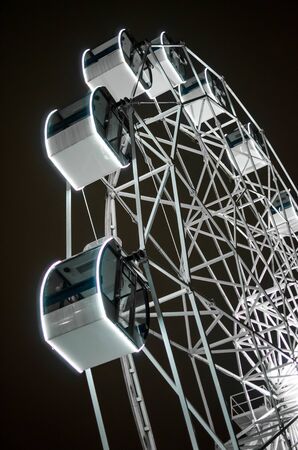 ferris wheel in white. working at nightの写真素材