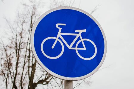 blue sign sign signing the boundary of the beginning of the cycling track.の写真素材