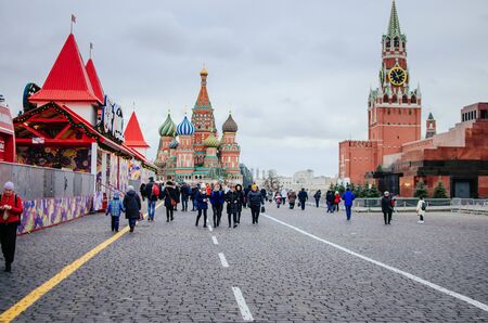 MOSCOW, RUSSIA - 9 January 2020 a crowd of tourists walking through the red square.のeditorial素材