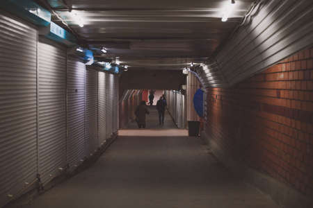 old poorly lit underpass made of brick Moscow Russia march 15, 2020.のeditorial素材