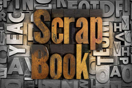 The words Scrap Book written in vintage letterpress typeの写真素材