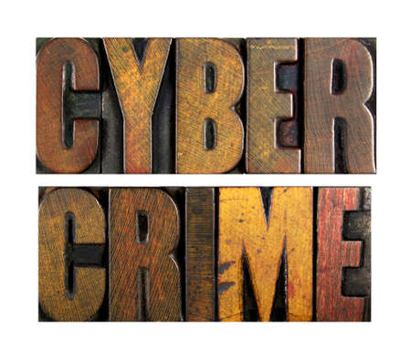 The words CYBER CRIME written in vintage letterpress typeの写真素材