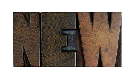 The word NEW written in vintage letterpress typeの写真素材