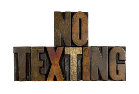 The words NO TEXTING written in vintage letterpress typeの写真素材