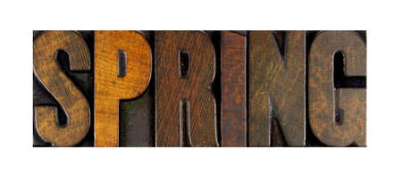 The word SPRING written in vintage letterpress typeの写真素材