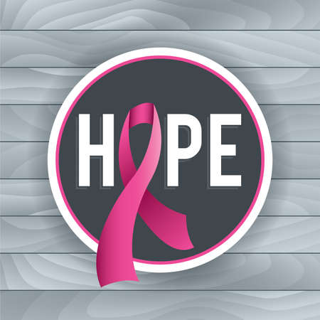 An illustration of a pink Breast Cancer Awareness ribbon and badge with the theme of HOPE. Light grey background of wood boards. Vector EPS 10 available. EPS file contains gradient mesh and transparencies.のイラスト素材
