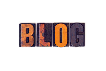 The word "Blog" written in isolated vintage wooden letterpress type on a white background.の写真素材