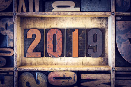 The word "2019" written in vintage wooden letterpress type.の写真素材