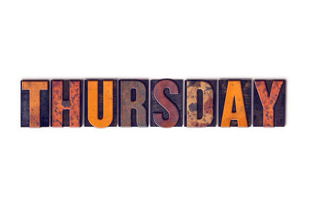 The word Thursday written in isolated vintage wooden letterpress type on a white background.