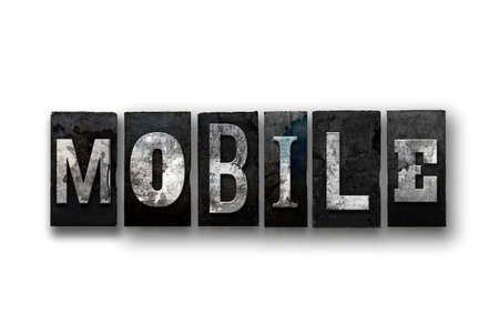 The word MOBILE written in vintage, dirty, ink stained letterpress type and isolated on a white...