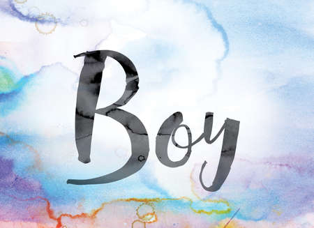 The word "Boy" painted in black ink over a colorful watercolor washed background concept and theme.の写真素材