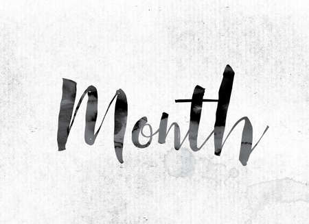 The word "Month" concept and theme painted in watercolor ink on a white paper.の写真素材