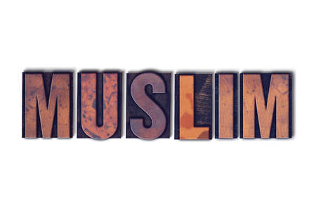 The word Muslim concept and theme written in vintage wooden letterpress type on a white background.の写真素材