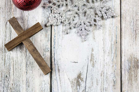 A holy Christian cross and Christmas holiday theme background.の写真素材
