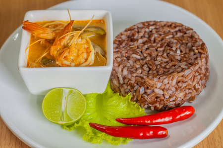 Tom Yam Kung and brown rice for healthの写真素材