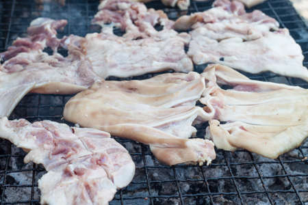 pork and chitterlings grill street food in thailandの写真素材