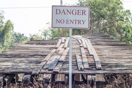 Old wooden bridge is broken unavailable.の写真素材