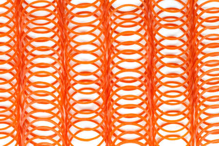 many red rubber bands on white backgroundの写真素材